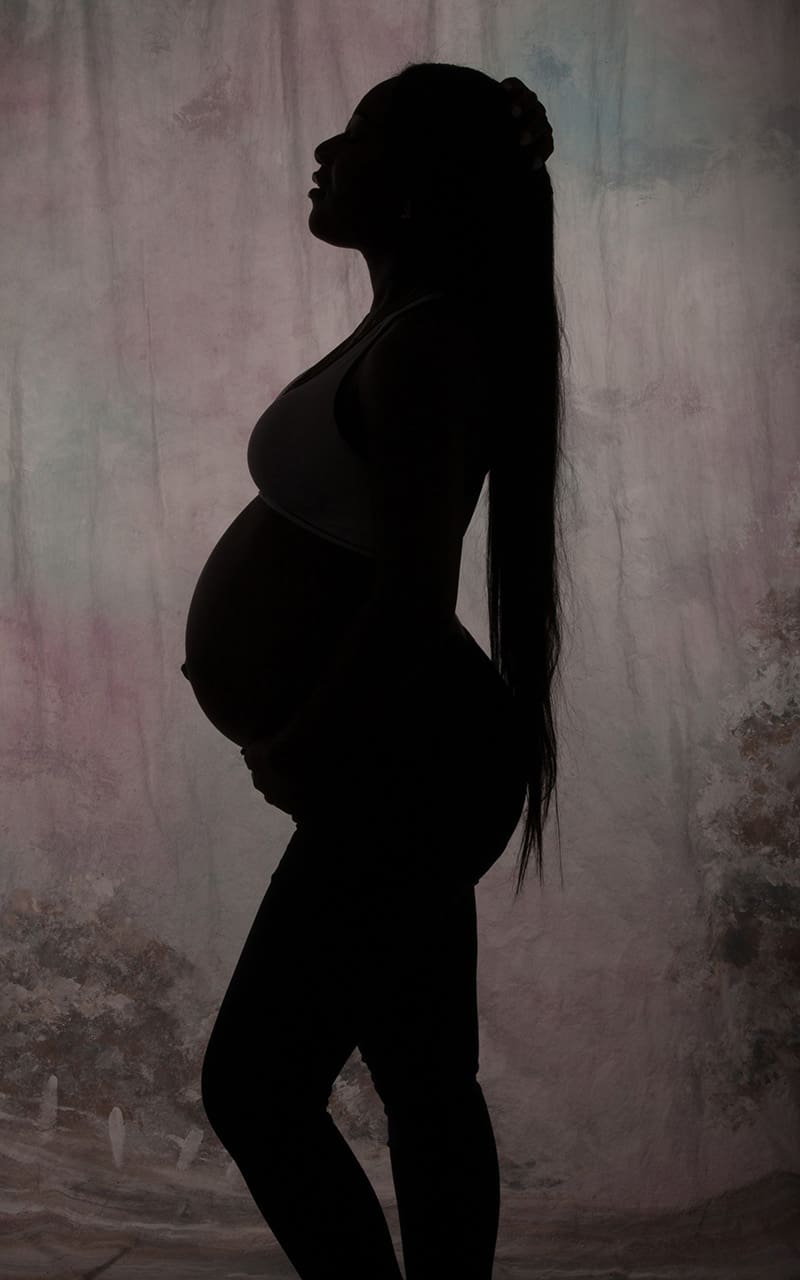 023 sihouette Maternity Portrait Photography showing a pregnant woman in silhouette