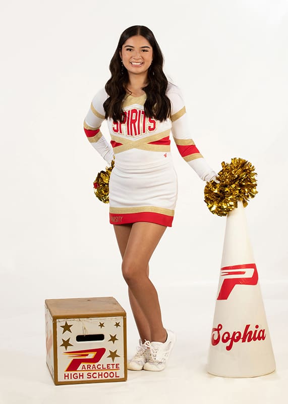 Evoto cheerleader with pompoms megaphone and box<br />
